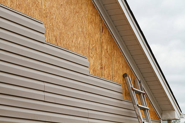 Professional Siding Repair technician working in Seville, OH